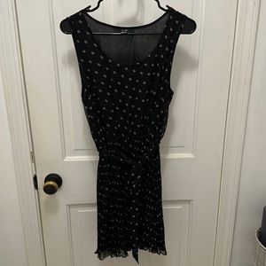 Black pleated dress with tan polka dots. Size medium.